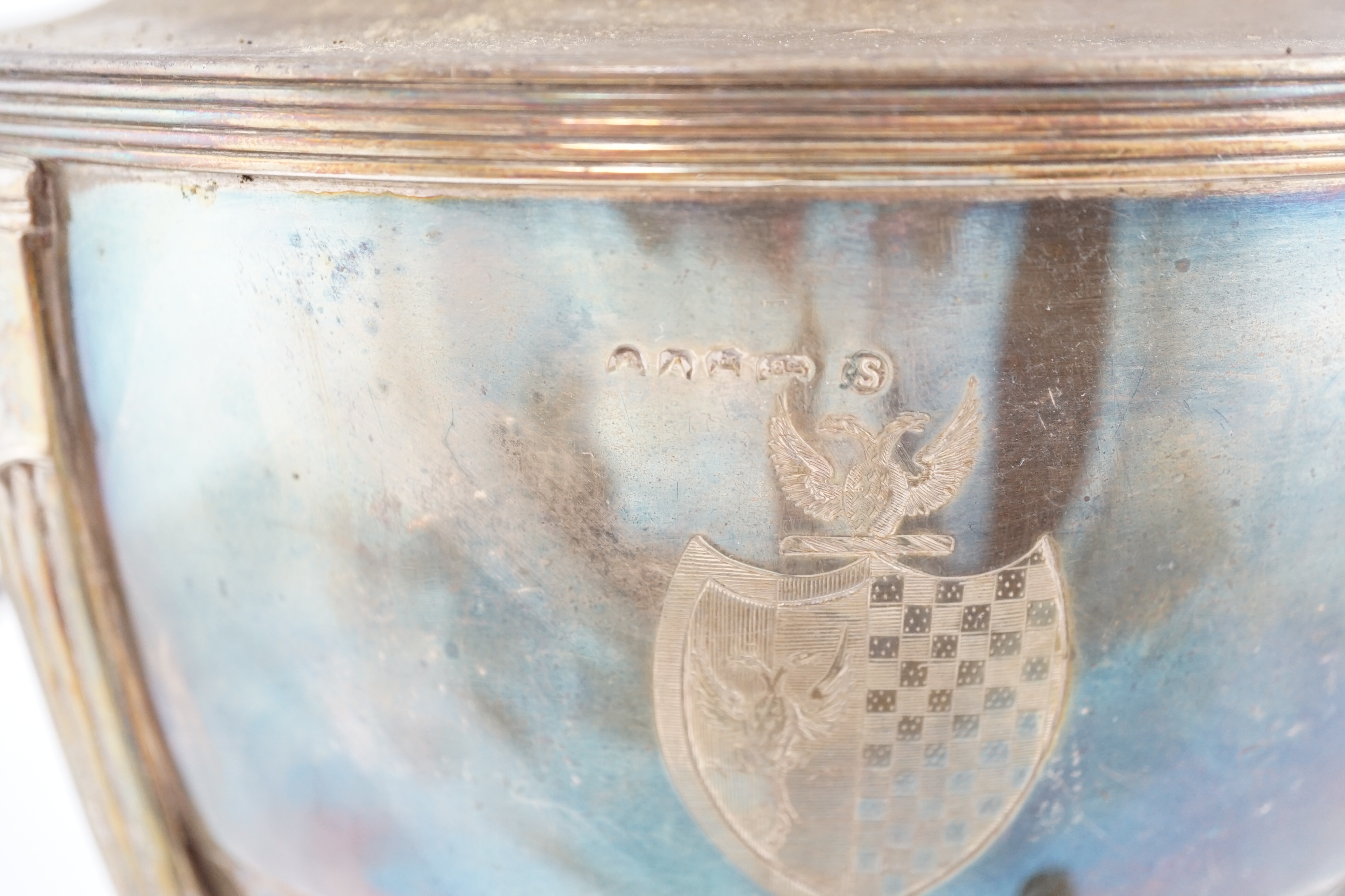 A George III demi-fluted silver tea urn and cover, by John Scofield